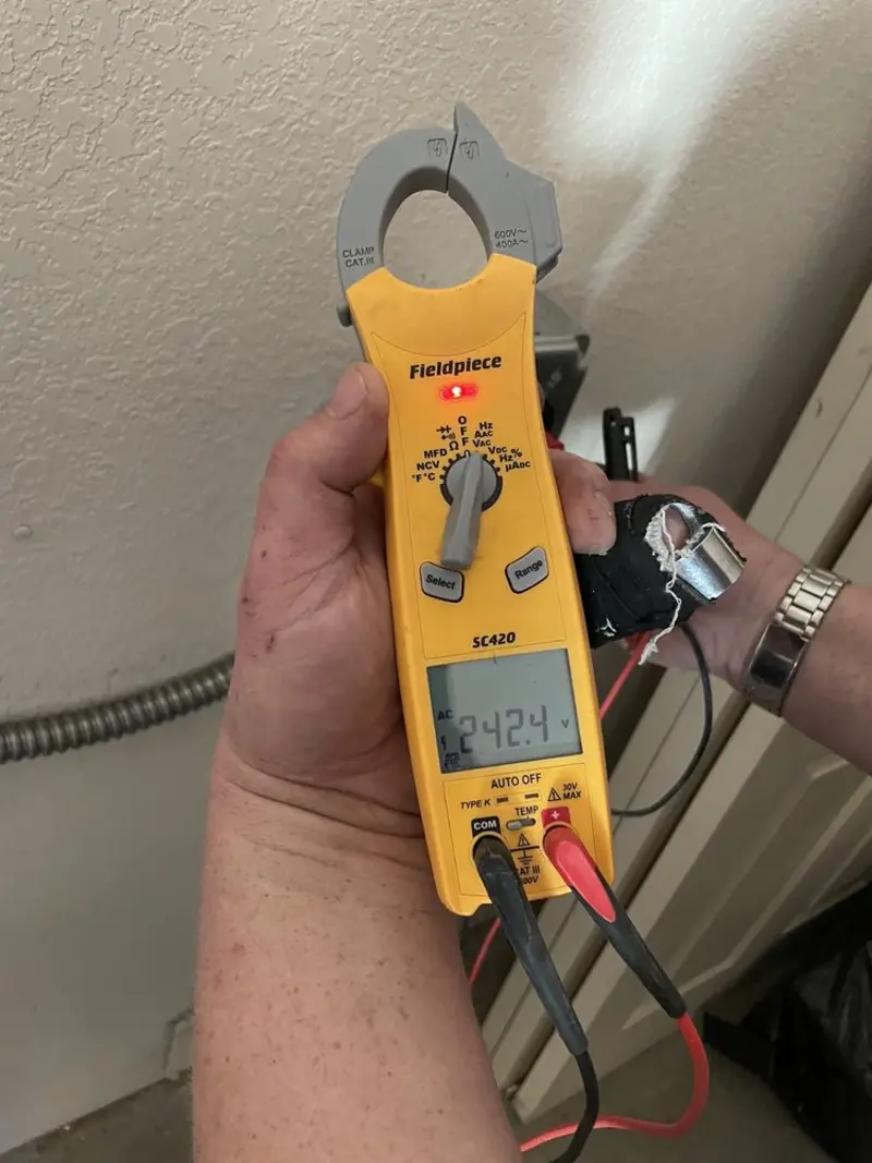 Voltage testing with clamp meter during Aluminum Wiring Replacement in Wapato